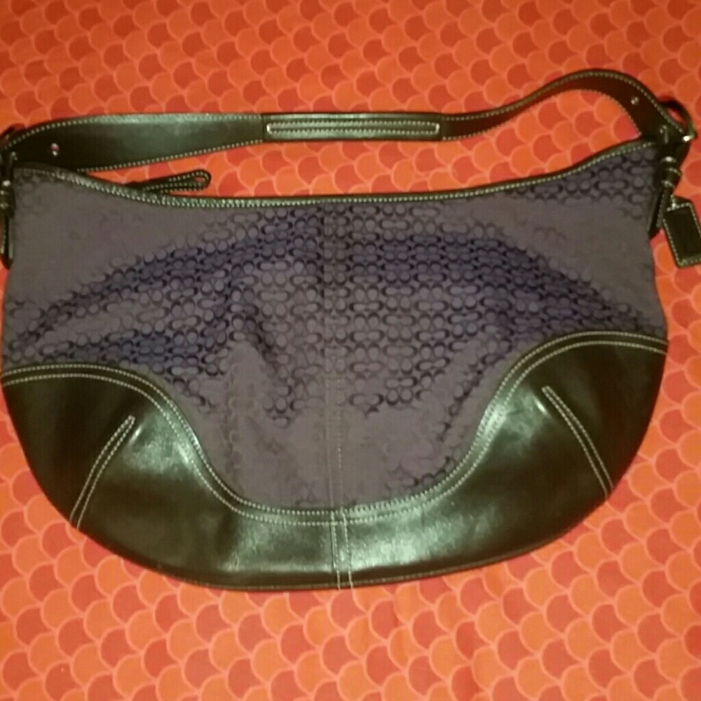 Coach material and leather bag